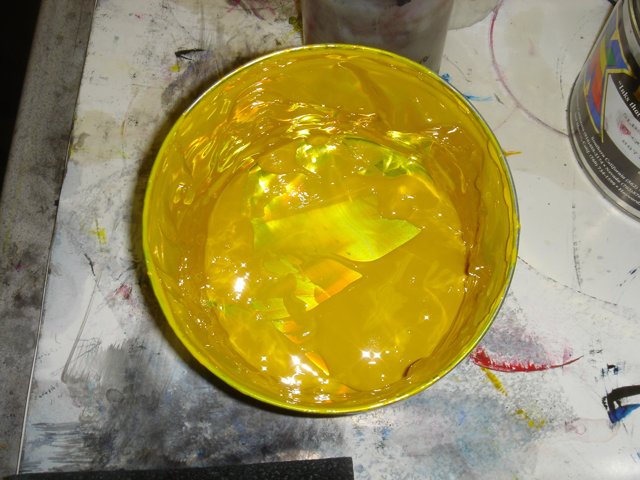 Yellow paint in a bowl