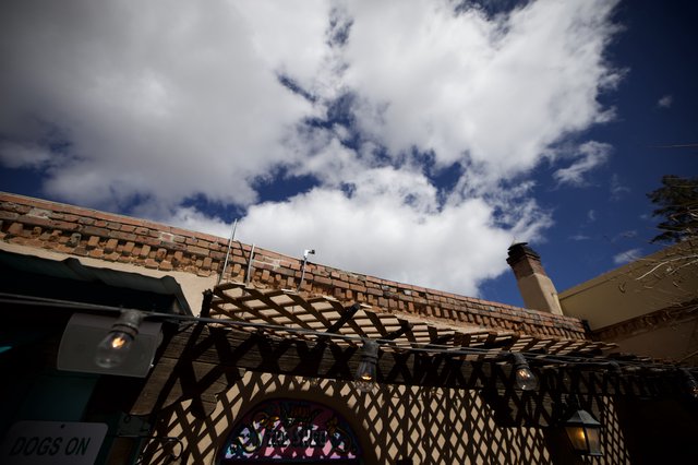 Southwestern Adobe Architecture Against Dramatic Sky