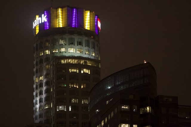 Metropolis Tower Lighting Up the City Sky