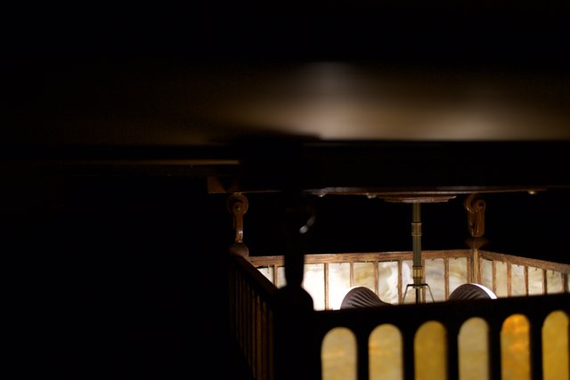 Illuminated Crib in Dark Room