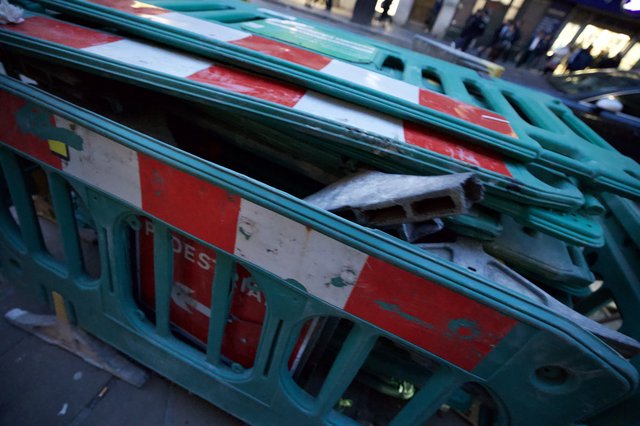 Construction Barriers Stacked at Urban Work Site