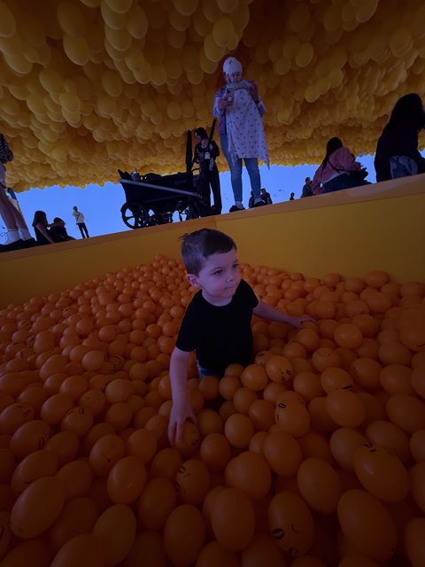 Playful Moments in a Sea of Spheres