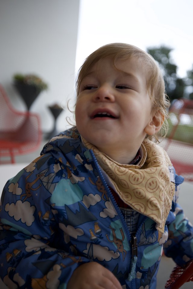Joyful Toddler in Colorful Winter Jacket