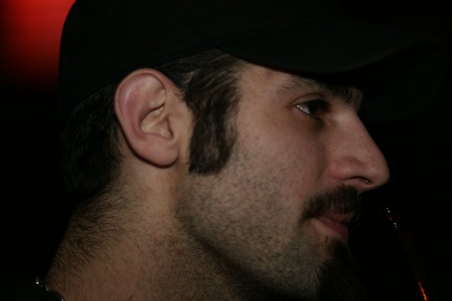 Mustached Man with a Cap