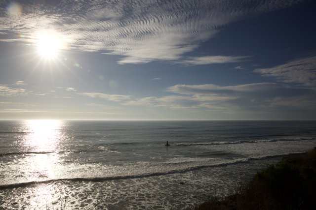 Surfing into the Sunrise at Halfmoon Bay