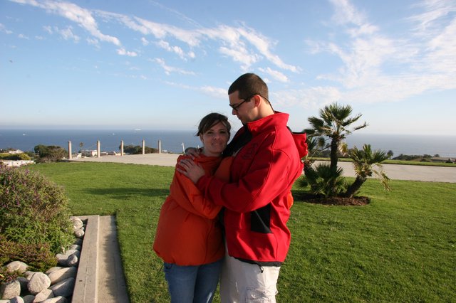 Couple Embracing Overlooking the Pacific Ocean