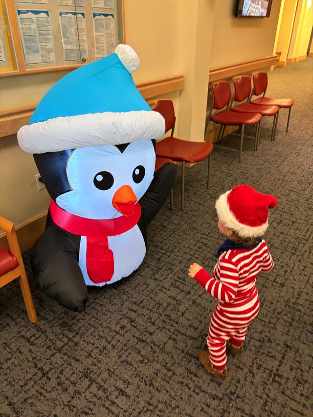 Magical Meeting Between Child and Inflatable Snowman