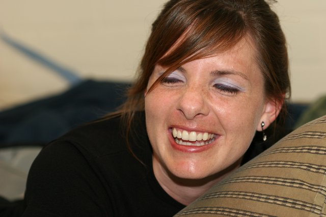 Joyful Woman Laughing on a Casual Evening
