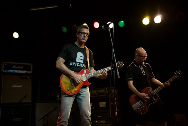Two Guitarists Rocking the Stage at Bad Religion Concert