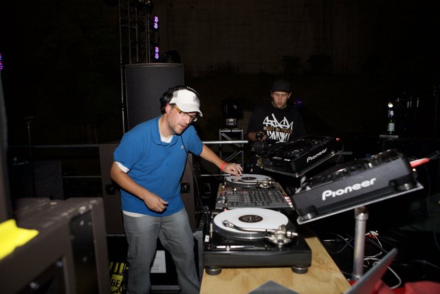 EDC Entertainer: Cameron W Playing Music on DJ Mixer