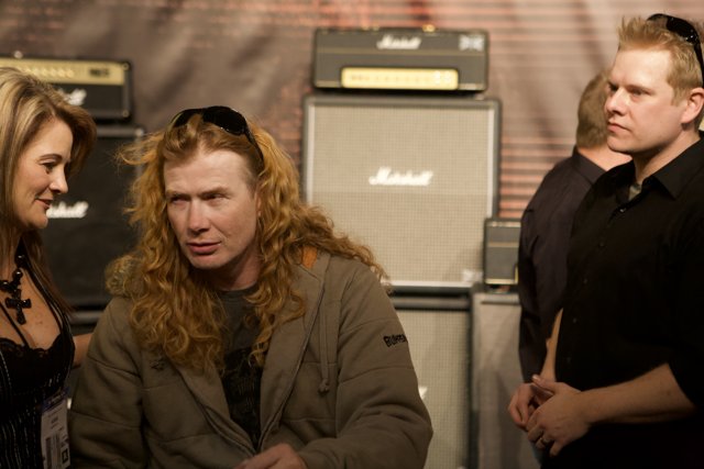 Dave Mustaine and Two Women at 2009 NAMM Event