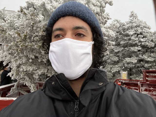 Snowy masked man