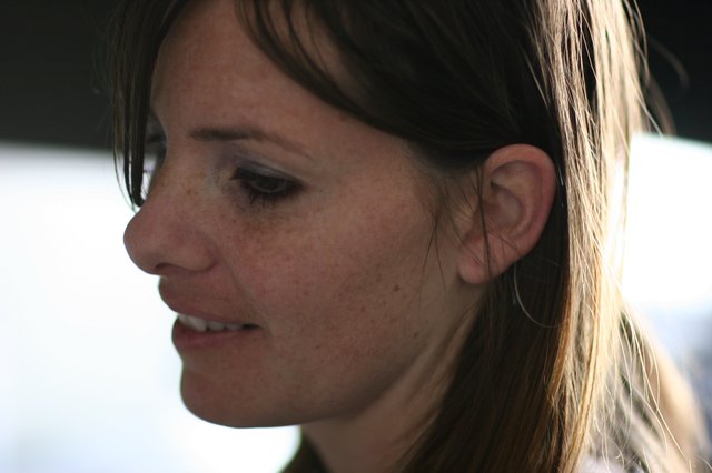 Candid Profile Portrait of a Freckled Young Woman
