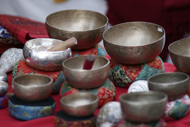 A Table Full of Metal Bowls