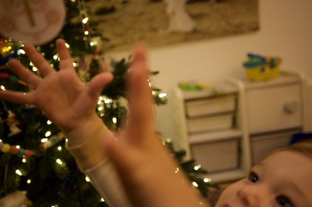 Baby's First Christmas Tree Moment