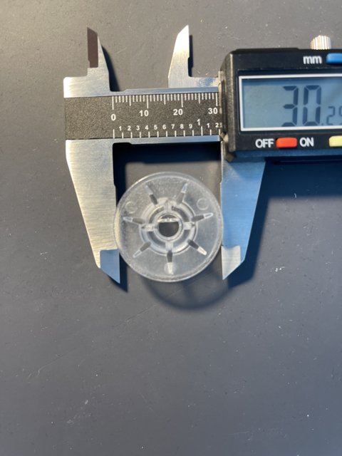 Measuring the Size of a Plastic Disk with a Caliper