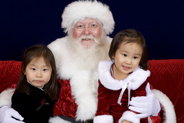 Santa Claus Visits Two Delighted Children