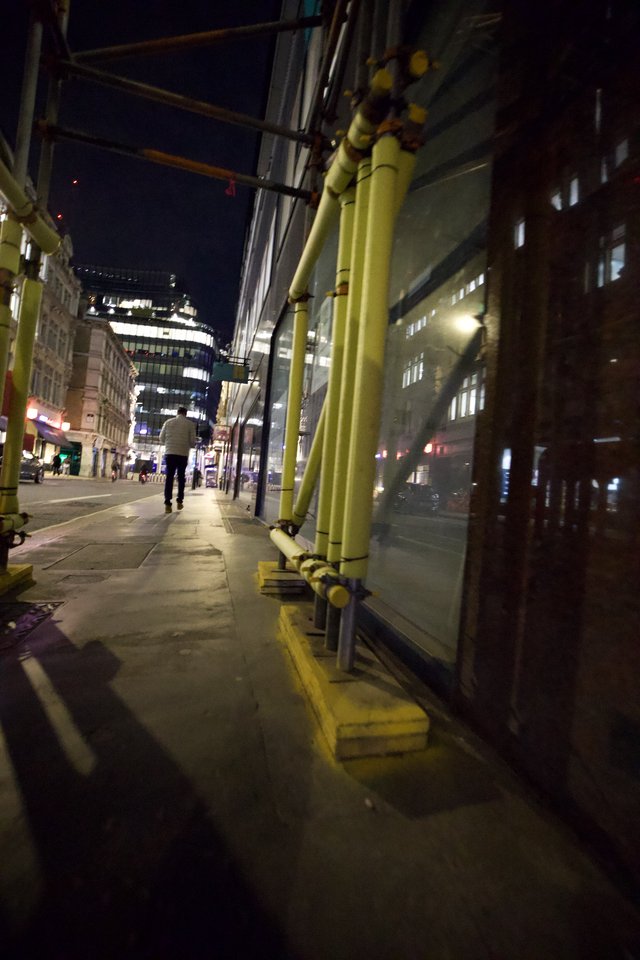 Yellow Scaffolding on London Street at Night