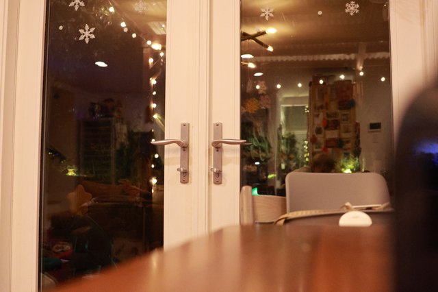 Cozy Christmas Evening Through French Doors