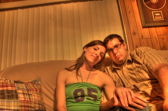 Couple Relaxing Together on Couch at Home