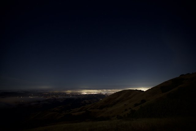 City Lights Glowing Beneath a Starlit Night Sky
