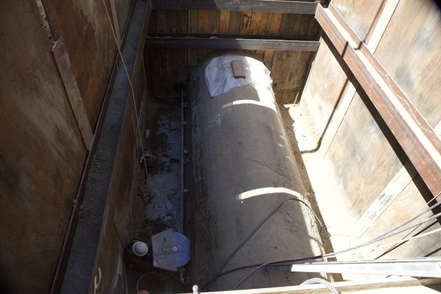 Plywood Tank in Concrete Building