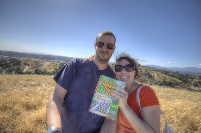 Couple Atop Los Angeles Hills with Secret Stairs Book