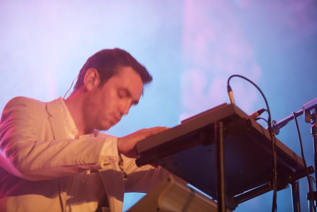 White-suited Man Plays Synth at Coachella