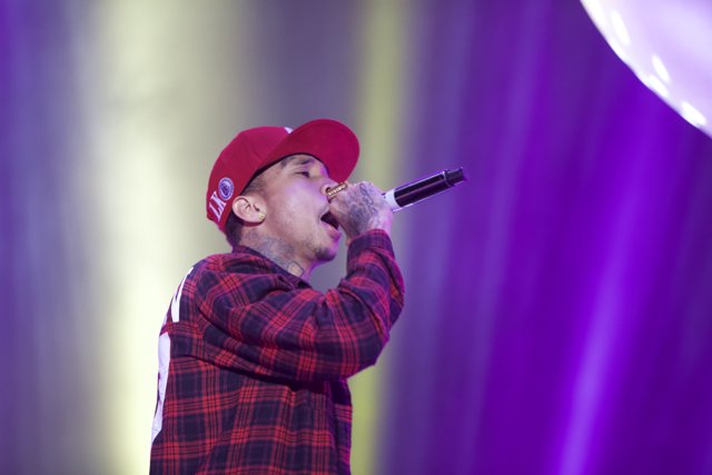 Tyga Rocks the Stage in his Red Baseball Hat