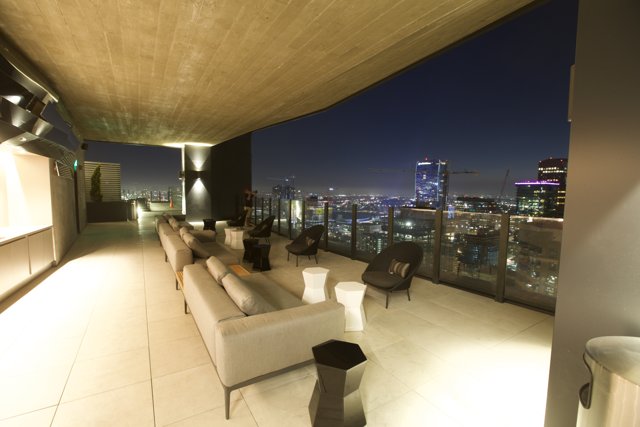 Penthouse Living Room with a Stunning Cityscape View