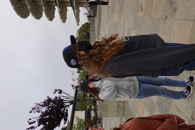 Masked Friends Taking Photos at Japanese Peace Plaza