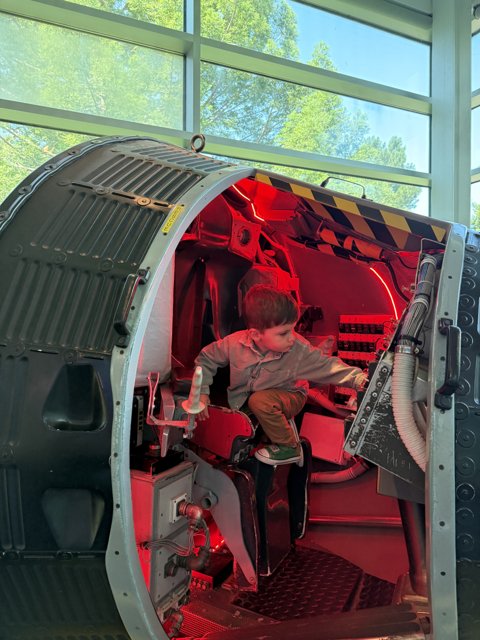 Young Explorer in the Capsule