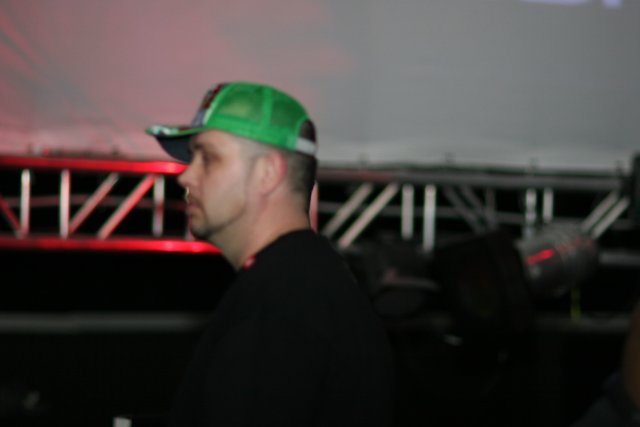 Green Caped Man at Funktions Party