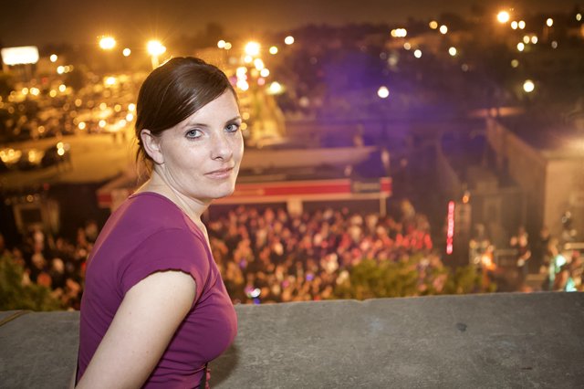 Woman Overlooking Electric Daisy Carnival from Above