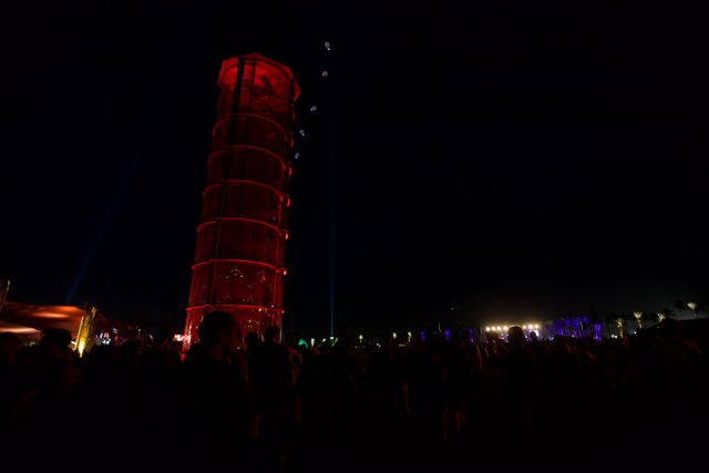 Red-Lit Tower Amongst Urban Light
