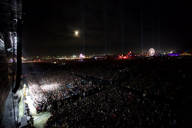 Under the Night Sky: A Concert Crowd Lights Up Coachella 2011 Album
