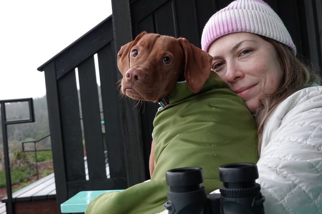 Woman and Dog Bundled Up Outdoors