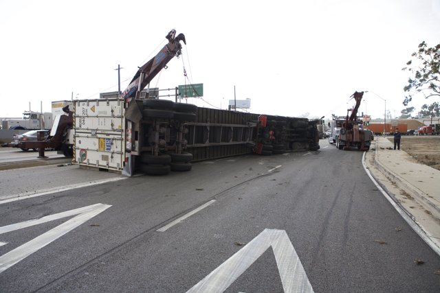 Overturned Truck Being Lifted Off the Road