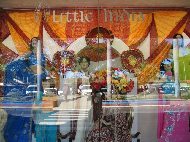 Boutique Window Display with Elegant Dresses