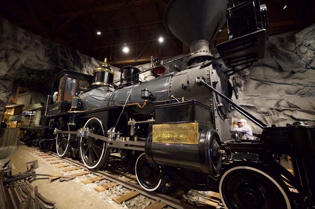 Historic Steam Locomotive on Display in Museum Setting