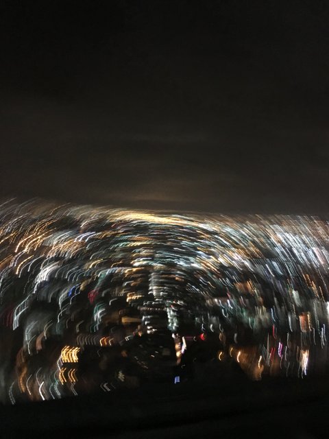 Blurred Fireworks in the Night Sky