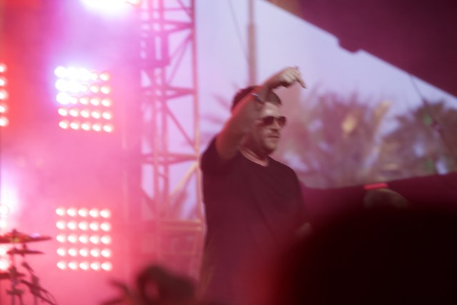Man in Sunglasses Rocks Coachella Stage