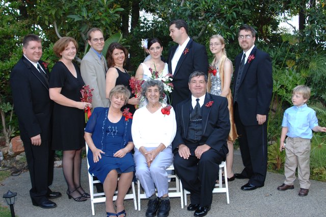 Family Wedding Portrait in Lush Garden Setting