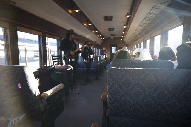 Musicians Performing on Vintage Train Journey