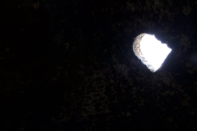 Illuminated Hole in the Cave