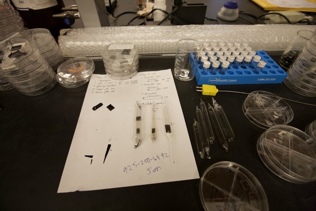 Lab Table with Test Tubes and White Board
