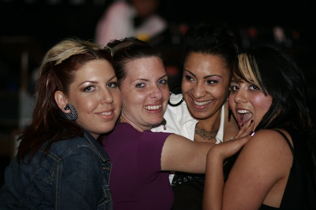 Four Friends Celebrate at a Nightclub Event 2006