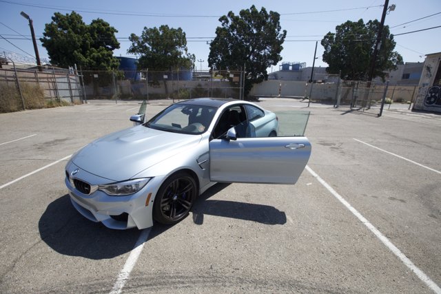 Parked BMW M4 with Spoke Alloy Wheels