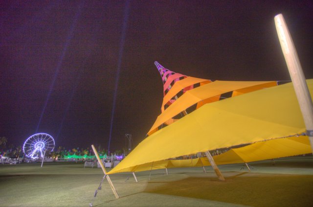 Yellow Umbrella under the Ferris Wheel