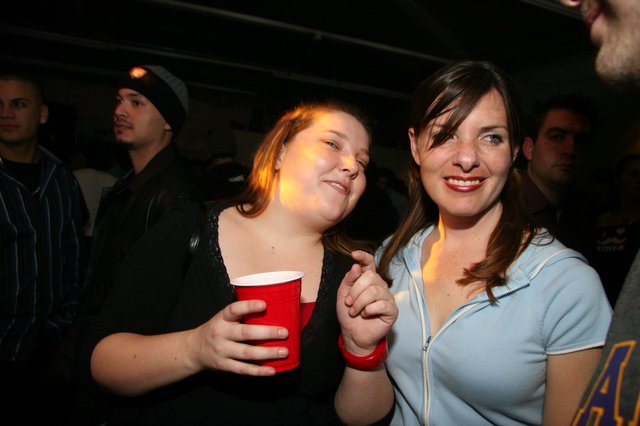 Two Friends Celebrating New Year's Eve 2005 Party